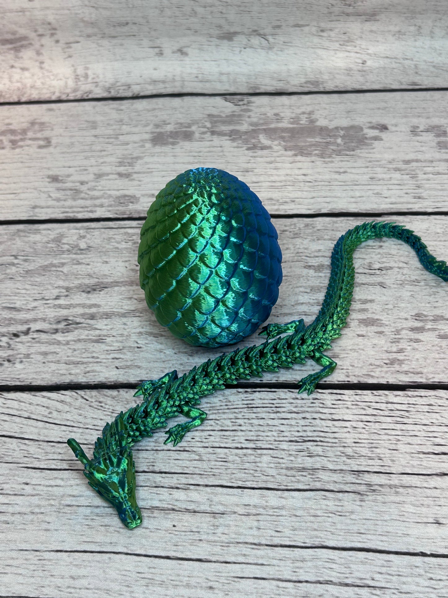 green/blue 3D printed dragon and egg