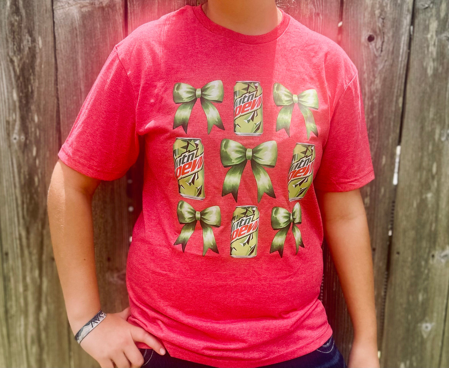Get ready to "Dew" it all in style with our playful Bow & MTN Dew Tee!